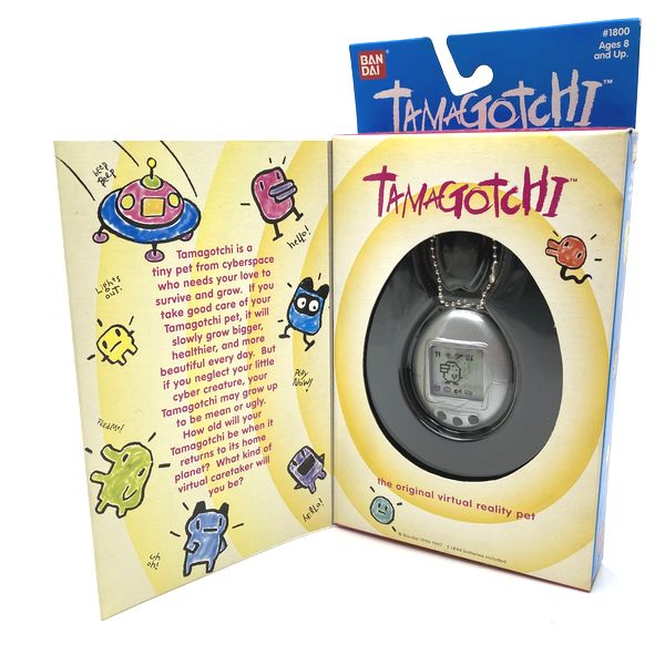 [NEW] [Not Guaranteed to Work : For Collection Only] Original Tamagotchi Silver Bandai English Model 1996-1997