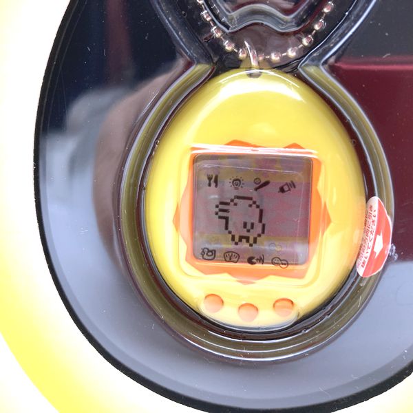 [NEW] [Not Guaranteed to Work : For Collection Only] Tamagotchi Original Yellow and Orange Bandai English Model 1996