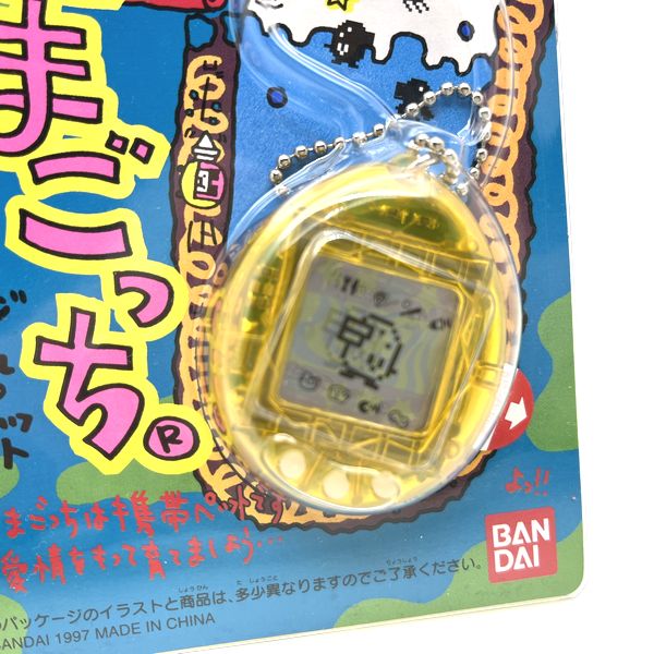 [NUEVO] [No se garantiza que funcione: solo para colección] Shinshu Hakken Tamagotchi Amarillo transparente 1997 Bandai