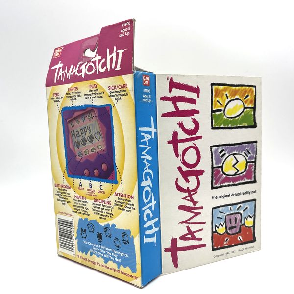 [NUEVO] [No se garantiza su funcionamiento: solo para colección] Tamagotchi Silver Bandai original, modelo inglés 1996-1997
