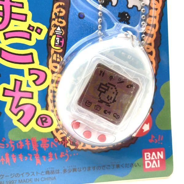 [NUEVO] [No se garantiza que funcione: solo para colección] Shinshu Hakken Tamagotchi Milky White 1997 Bandai